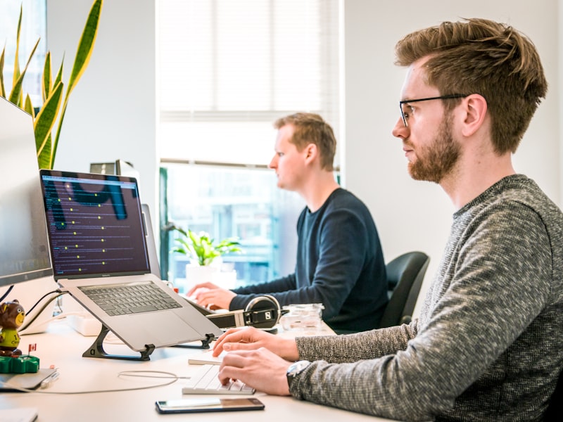 Modern web project workspace with laptop and interface mockups